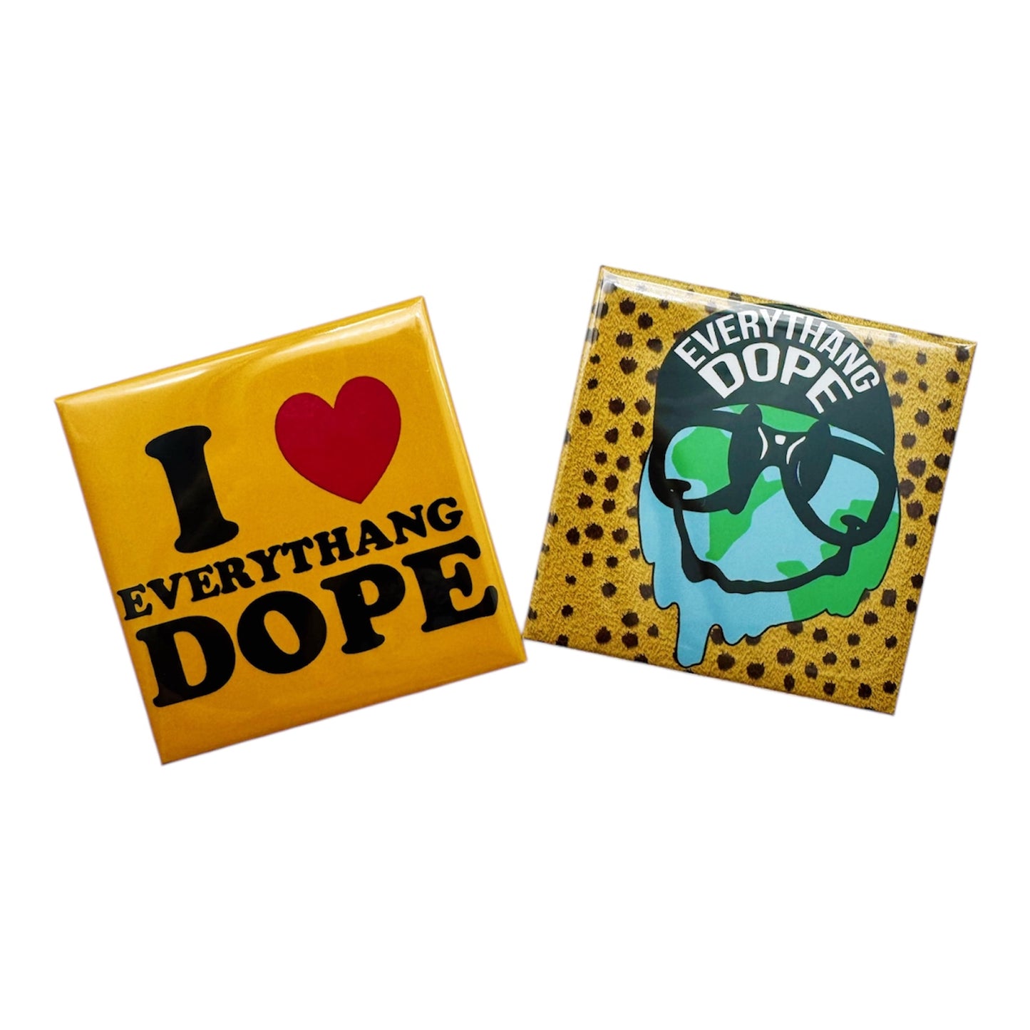 Two square magnets with a yellow background, one featuring the text 'I love DOPE' with a red heart symbol replacing the word 'love', and the other with a graphic of a character wearing sunglasses and a hat, with the text 'EVERYTHING DOPE'.