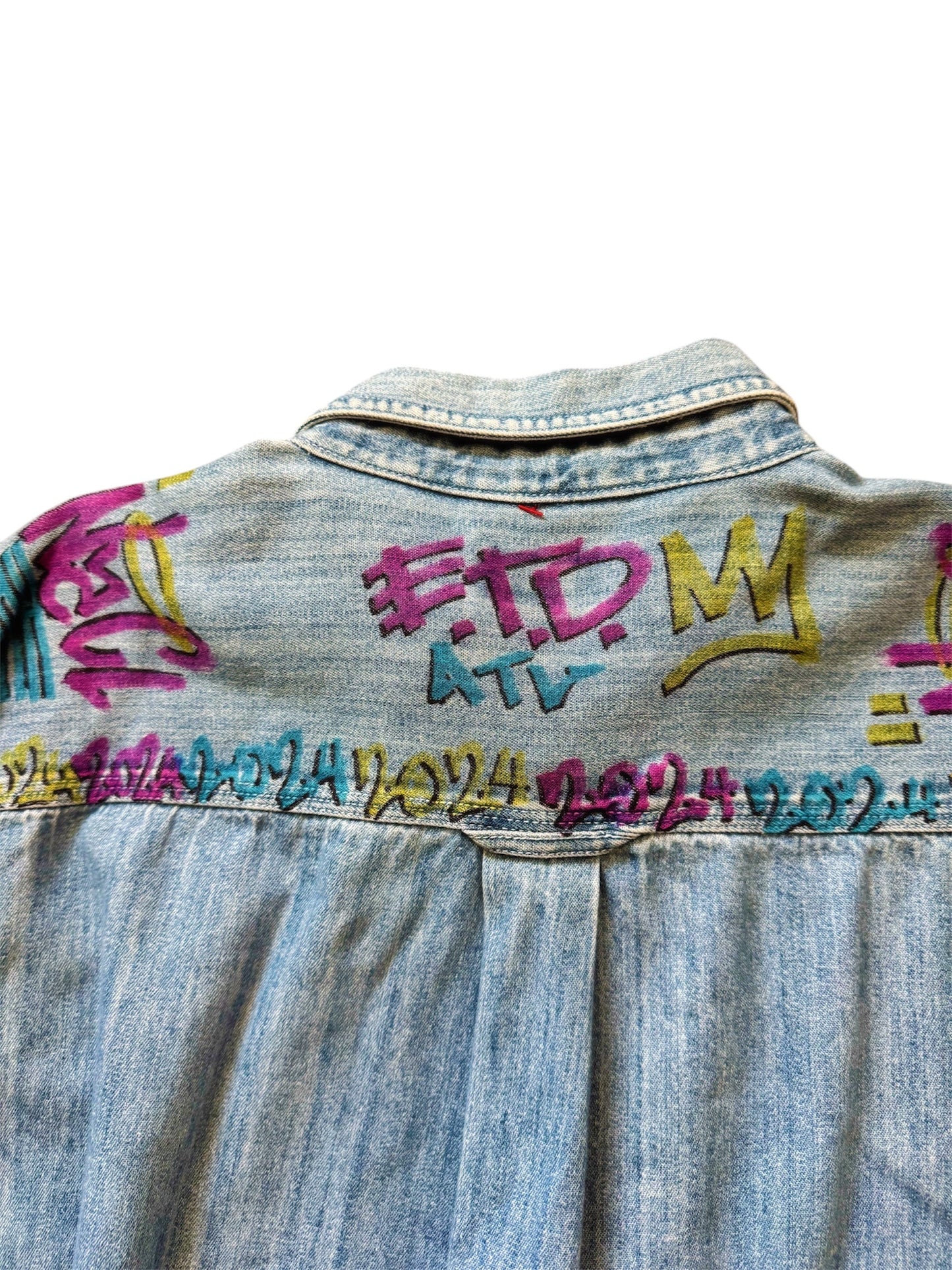 Custom denim jeans with Naclie Jawn multicolor graffiti by Everythang Dope, one-of-one streetwear.