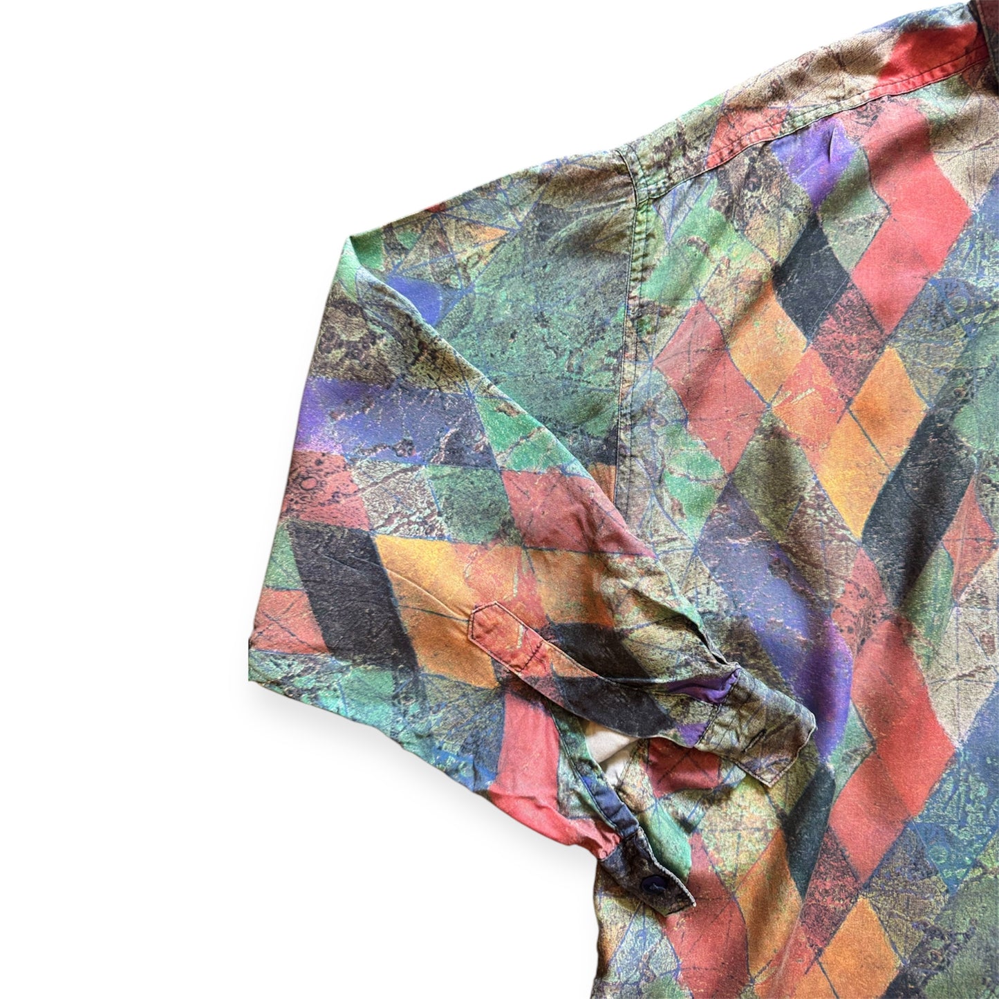 1990s geometric patterned button-up shirt by Everythang Dope, colorful retro fashion.