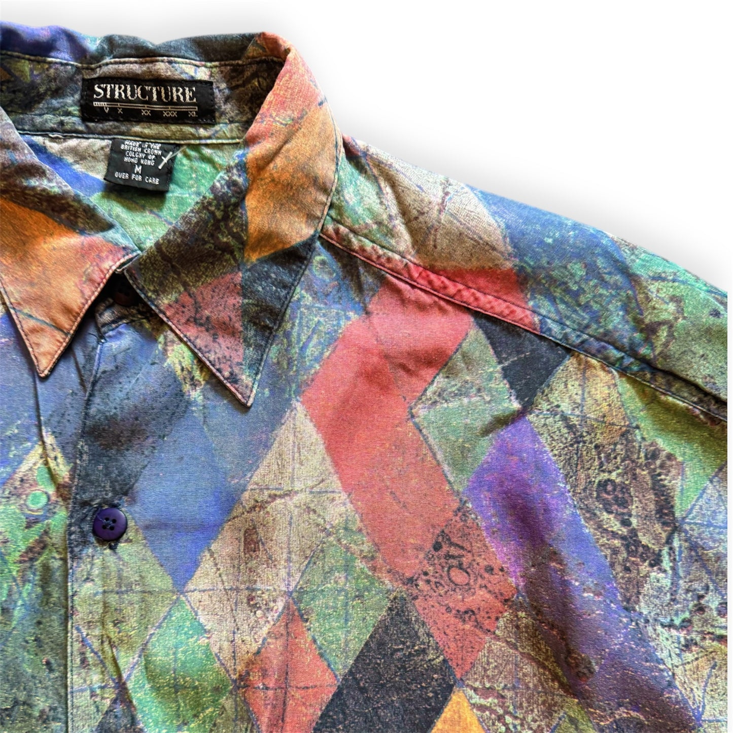 1990s geometric patterned button-up shirt by Everythang Dope, colorful retro fashion.