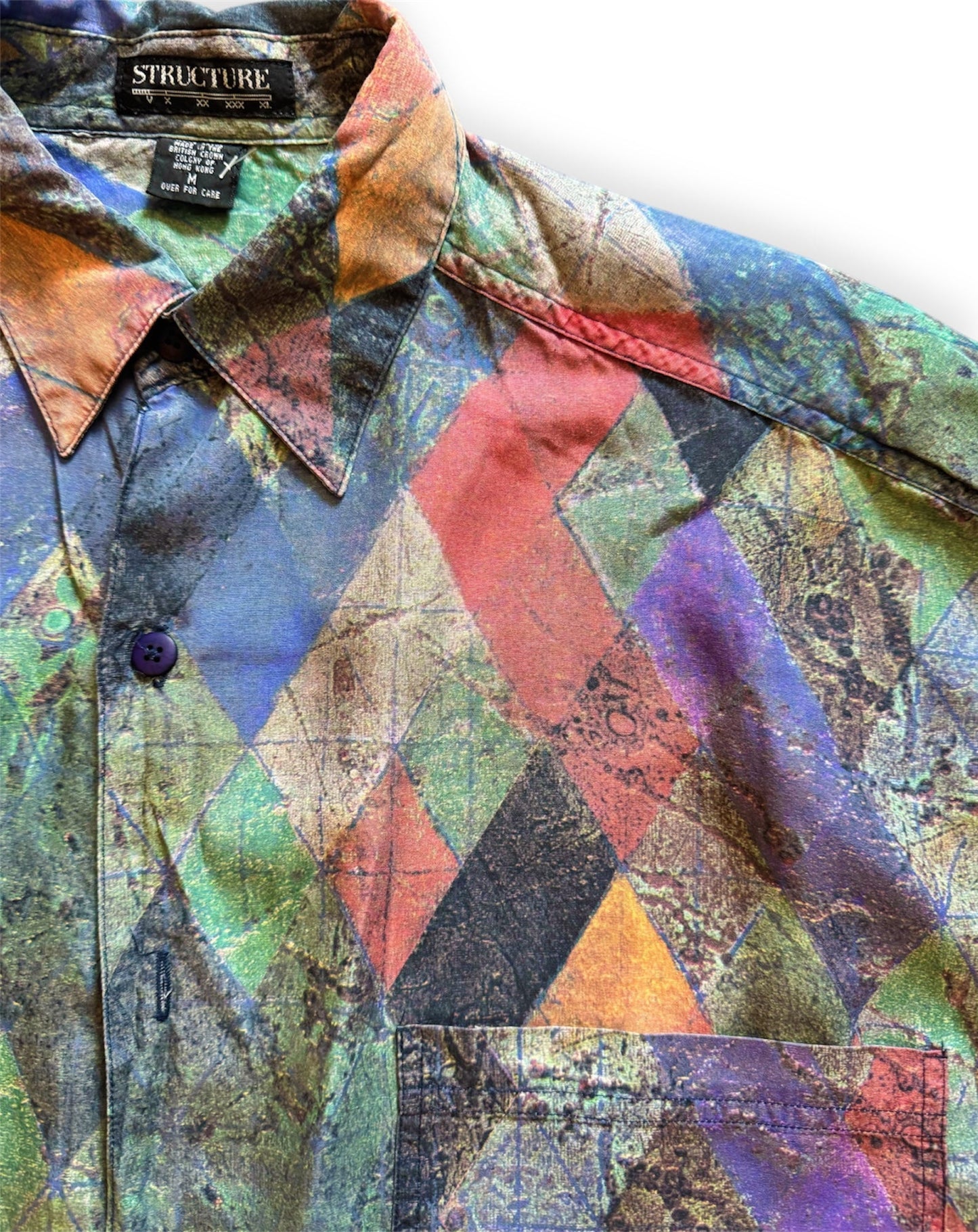 1990s geometric patterned button-up shirt by Everythang Dope, colorful retro fashion.