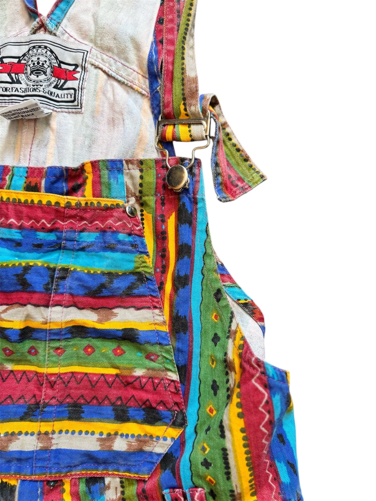 Multicolor vintage overalls by Everythang Dope, playful 90s streetwear.