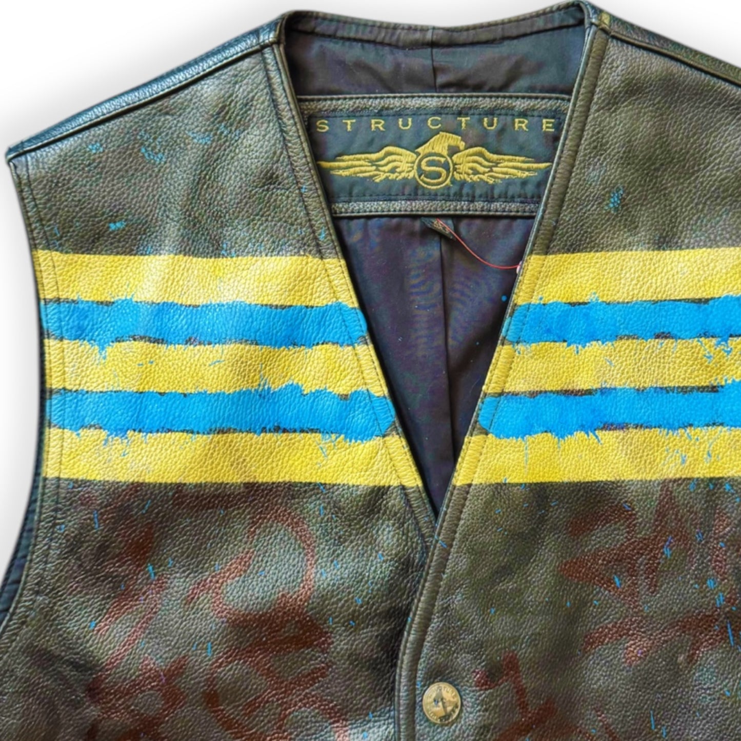 Vintage leather vest hand-painted with graffiti by Everythang Dope, custom streetwear statement piece.
