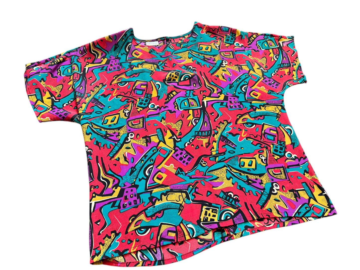 Vintage red 80s top with abstract Art Deco design, retro fashion from Everythang Dope.