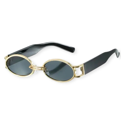 A pair of vintage 90s style sunglasses with gold frame and black lenses.