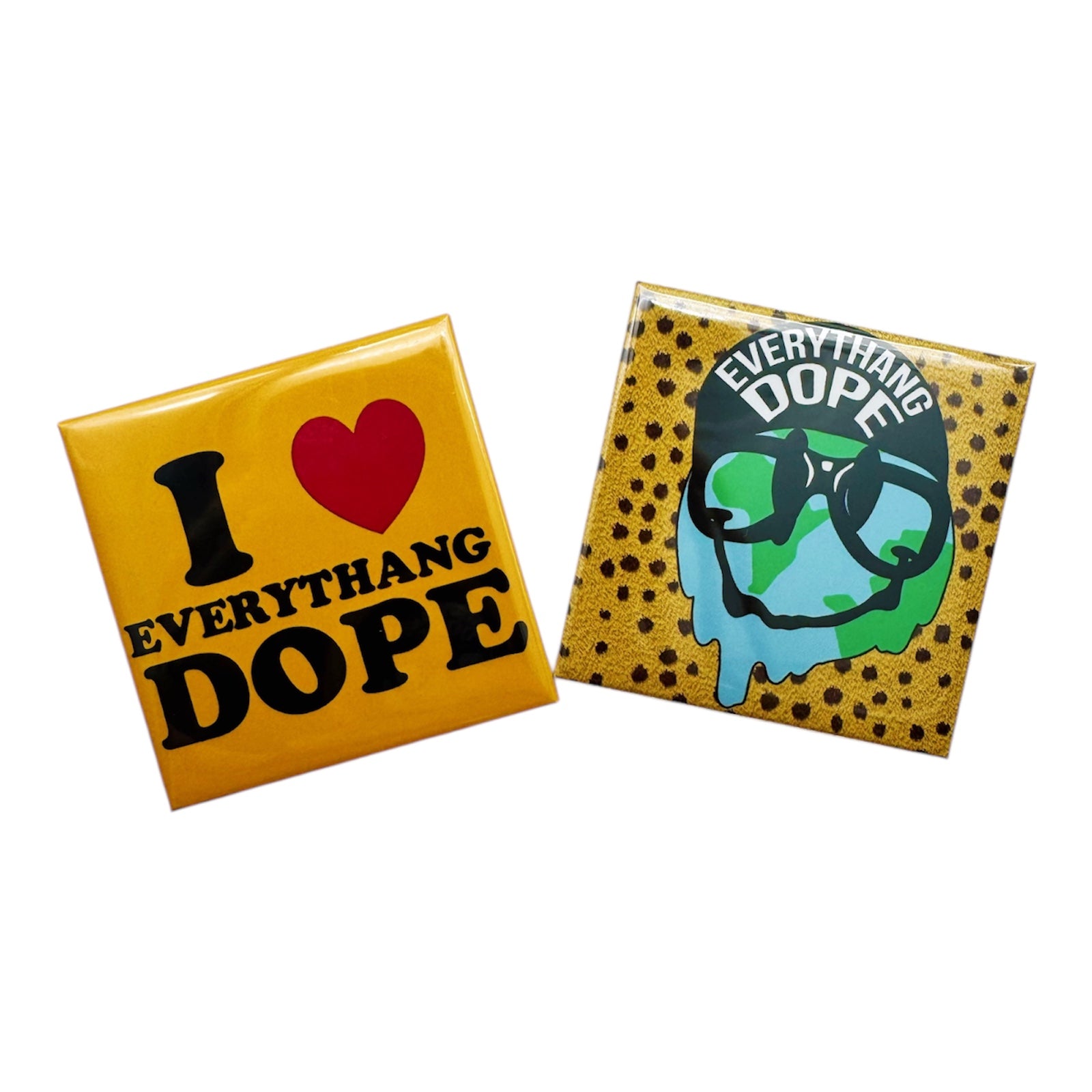 Two square magnets with a yellow background, one featuring the text 'I love DOPE' with a red heart symbol replacing the word 'love', and the other with a graphic of a character wearing sunglasses and a hat, with the text 'EVERYTHING DOPE'.