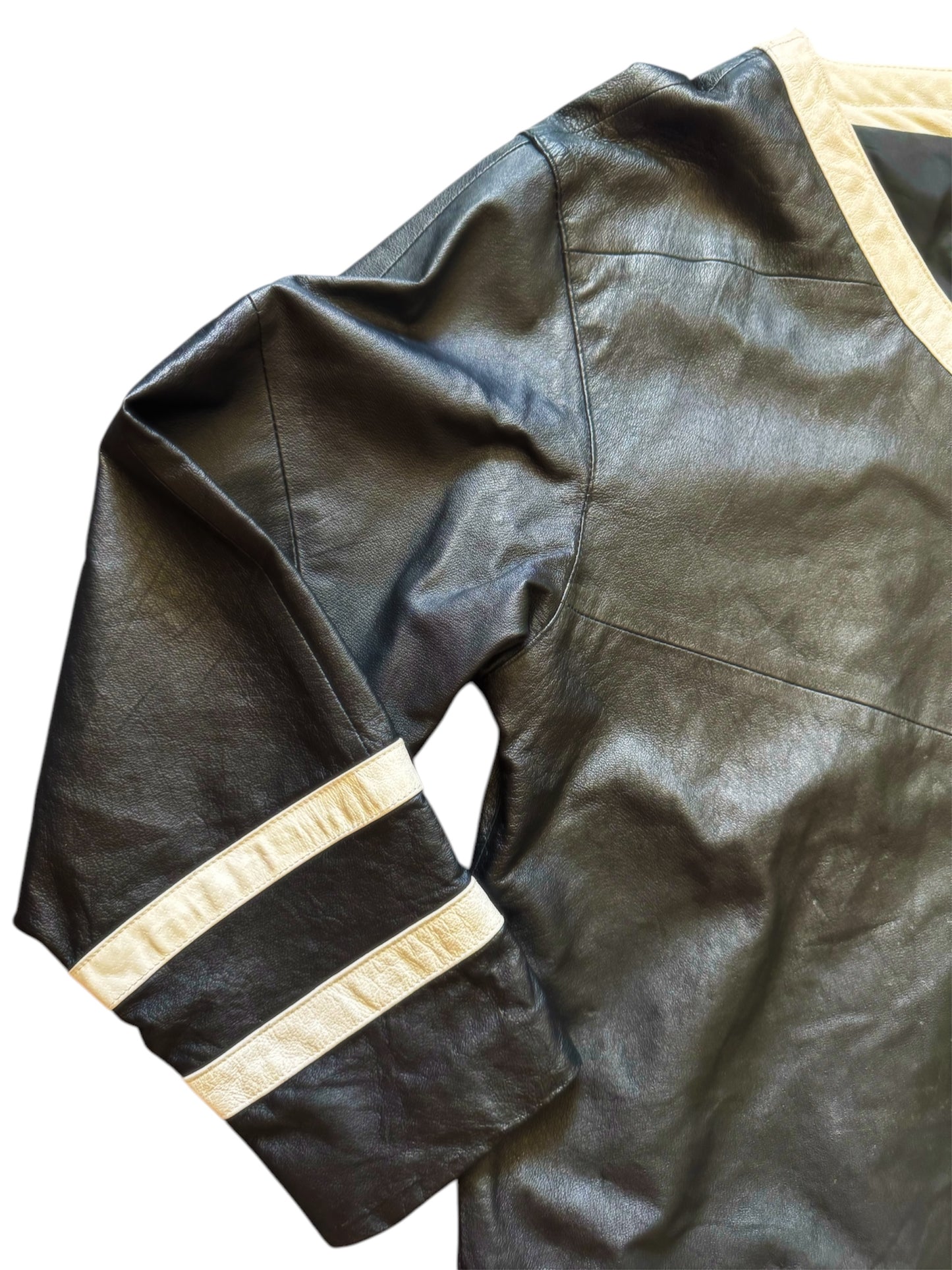 Black leather hockey jersey by Everythang Dope, edgy retro streetwear.