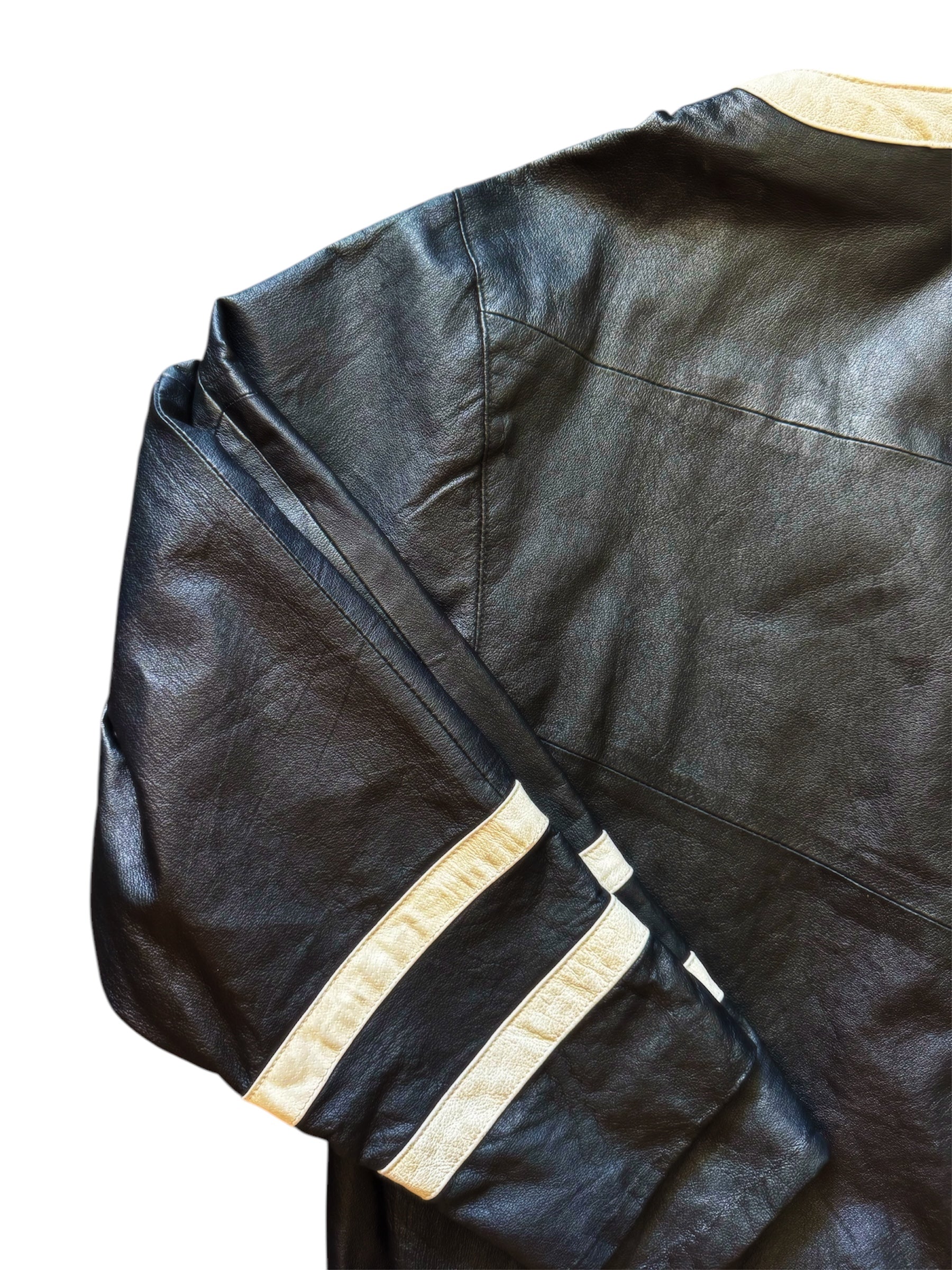 Black leather hockey jersey by Everythang Dope, edgy retro streetwear.