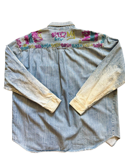 Custom denim jeans with Naclie Jawn multicolor graffiti by Everythang Dope, one-of-one streetwear.