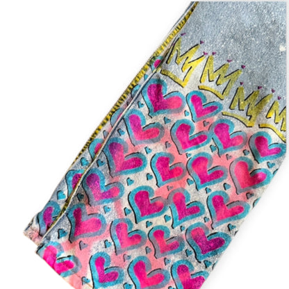 Custom denim jeans with Naclie Jawn multicolor graffiti by Everythang Dope, one-of-one streetwear.