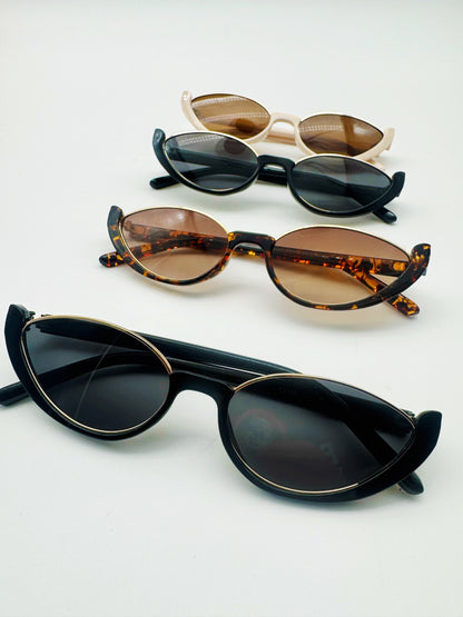 Cutie Eye sunglasses from Everythang Dope, playful 90s retro eyewear.