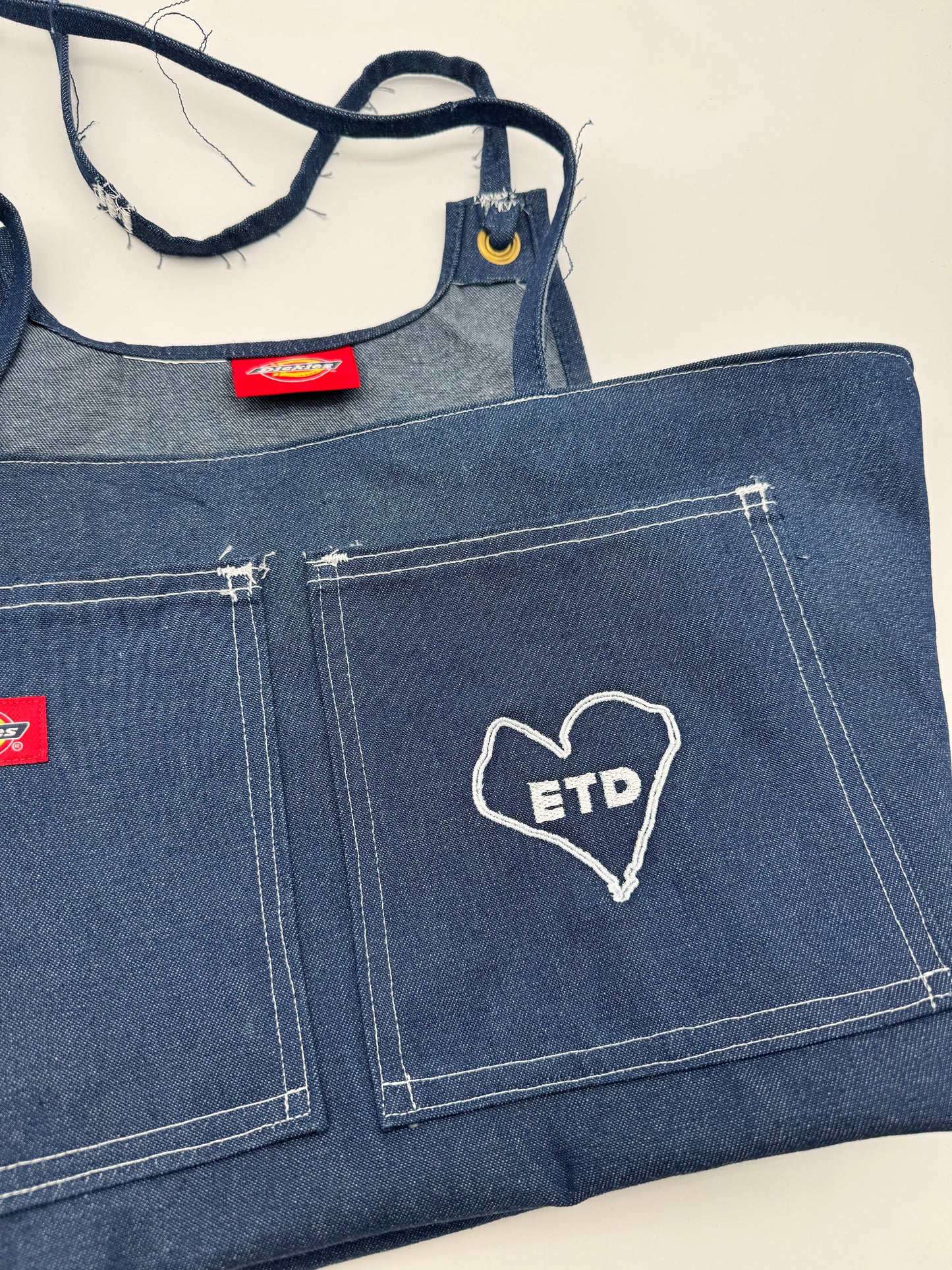 Custom denim branded bag by Everythang Dope, upcycled vintage streetwear accessory.