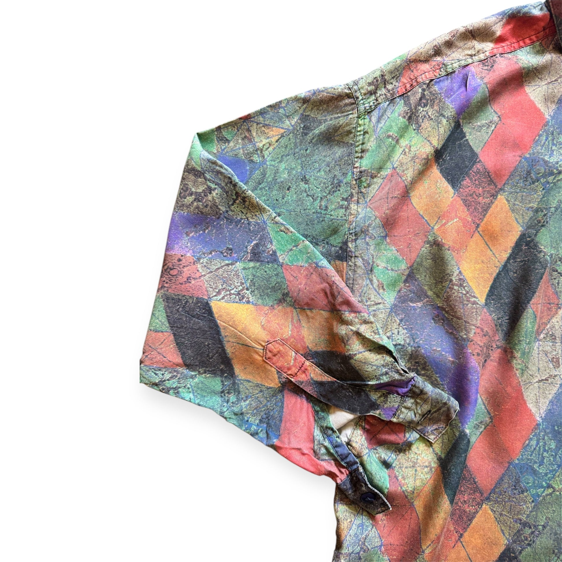 1990s geometric patterned button-up shirt by Everythang Dope, colorful retro fashion.