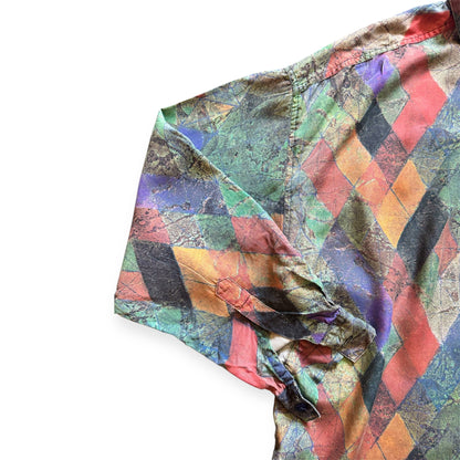 1990s geometric patterned button-up shirt by Everythang Dope, colorful retro fashion.