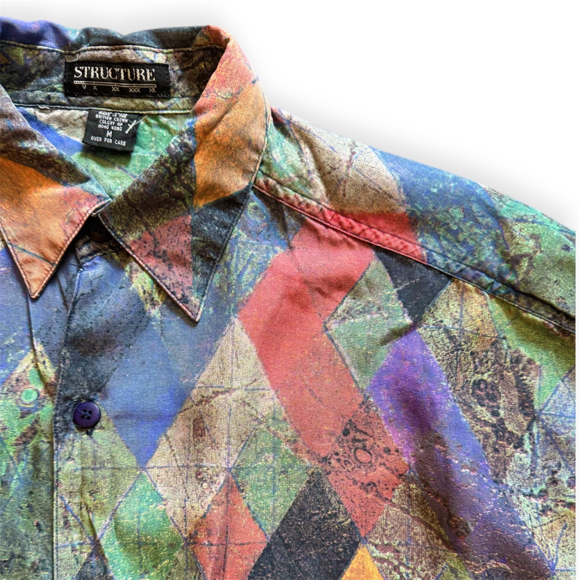 1990s geometric patterned button-up shirt by Everythang Dope, colorful retro fashion.