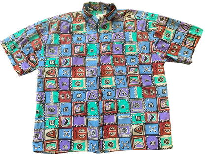 Multicolor button-up shirt in blue, pink, and yellow by Everythang Dope, 90s retro style.
