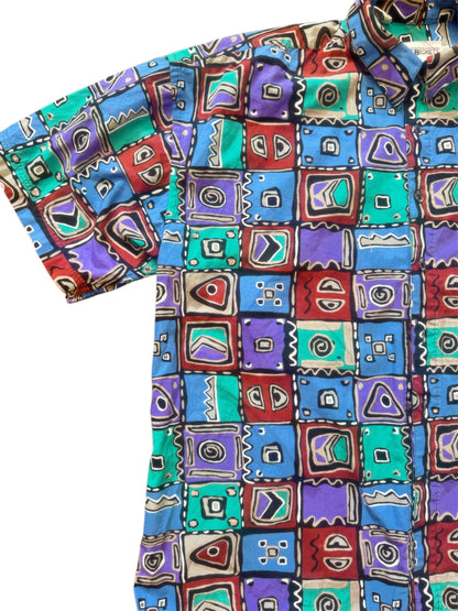 Multicolor button-up shirt in blue, pink, and yellow by Everythang Dope, 90s retro style.