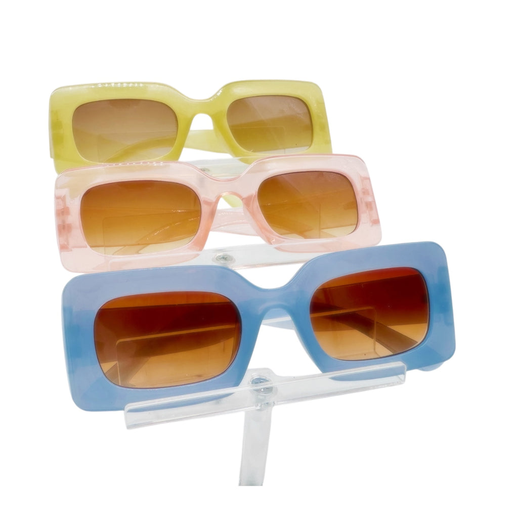 Variety of square sunglasses in pink, green, and blue, vintage eyewear by Everythang Dope.