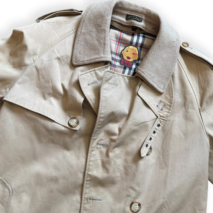 Lux vintage khaki trench coat by Everythang Dope, timeless outerwear piece with elevated retro style.
